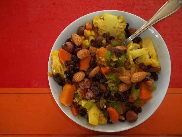 Vegetables seasoned with homemade curry.